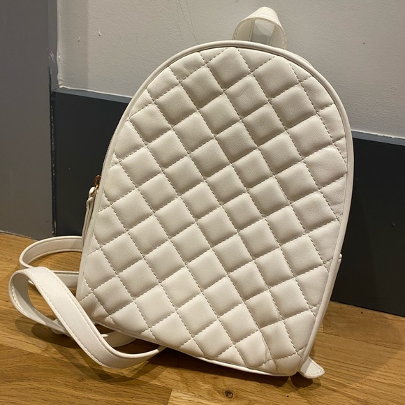 Forever 21 Handbags - White quilted mini backpack bag